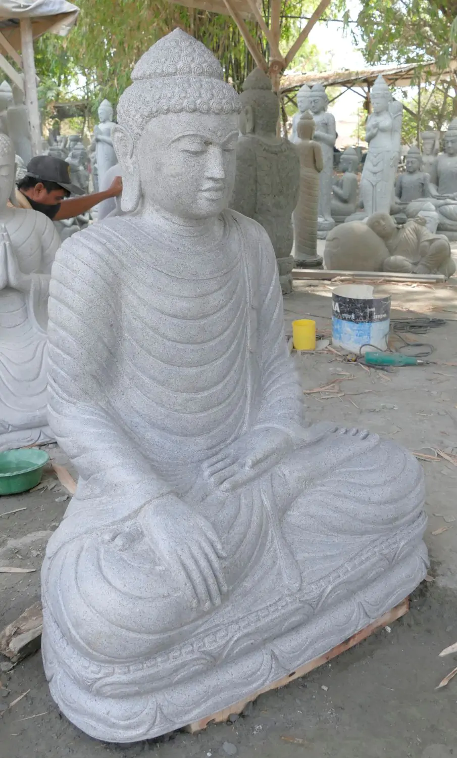  Product image 3 of the product “Seated Buddha made of Riverstone in Bhumisparsha - gesture of touching the earth. 117 cm height. ”